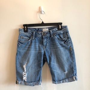 Distressed denim shorts